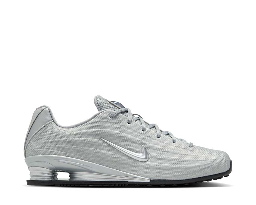 Sneaker argento con ammortizzazione a colonna