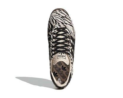 Scarpe sportive da donna in stile retrò con motivo zebrato.