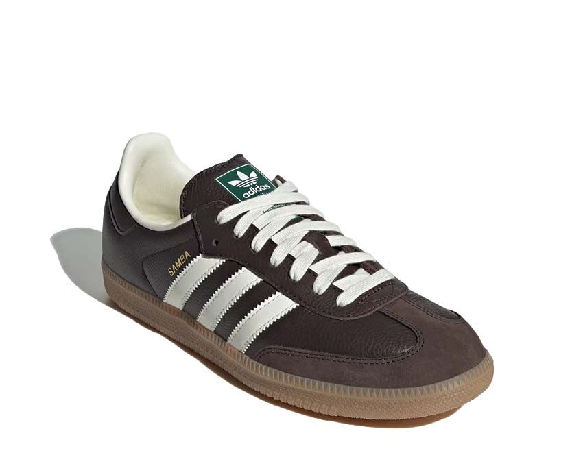 Scarpe da ginnastica in pelle marrone scuro con suola in gomma