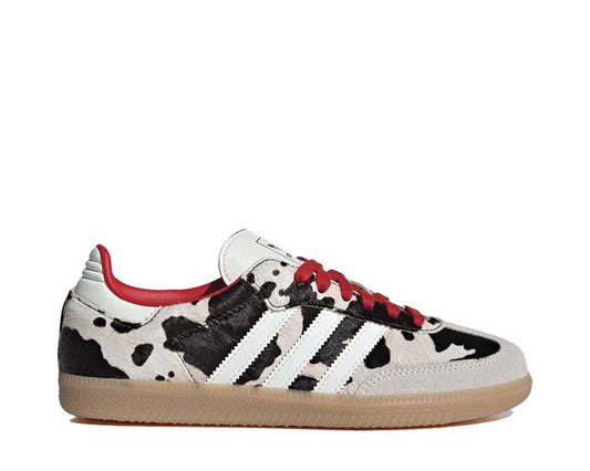 Scarpe da ginnastica basse in pelle con motivo mucca per donna