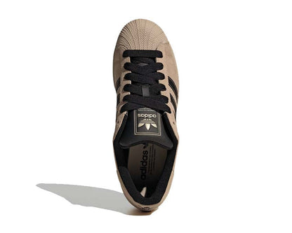 Scarpe da ginnastica in pelle color cachi pietra con design iconico a conchiglia