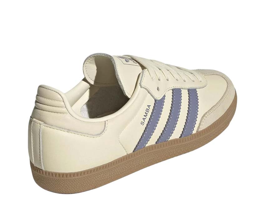 Scarpe da ginnastica classiche da donna in pelle e tessuto color argento e viola.