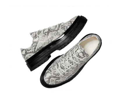 Scarpe basse in stile classico con motivo a pelle di serpente