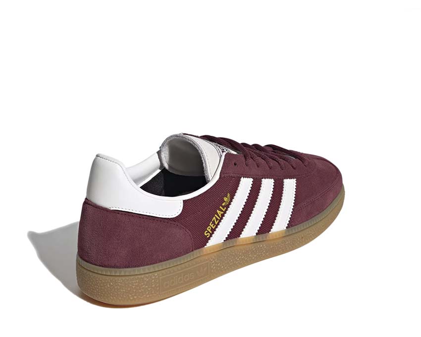 Scarpe da ginnastica per pallamano in colore rosso scuro.