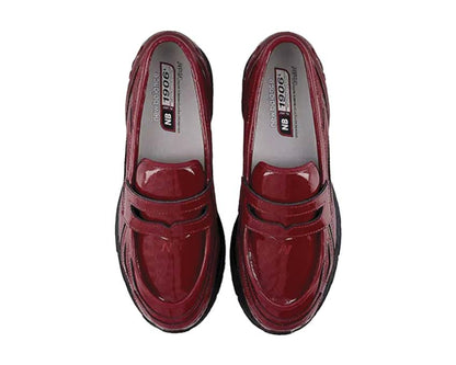 Scarpe da ginnastica rosse con motivo a coccodrillo