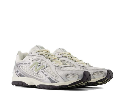 Scarpe da ginnastica in pelle e tessuto con design ispirato al serpente.