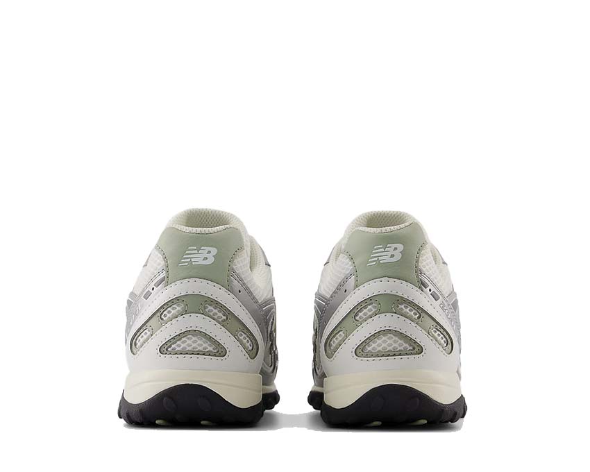 Scarpe da ginnastica in pelle e tessuto con design ispirato al serpente.