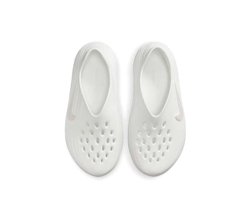 Scarpe da ginnastica con ammortizzazione reattiva e design elegante in colore chiaro.