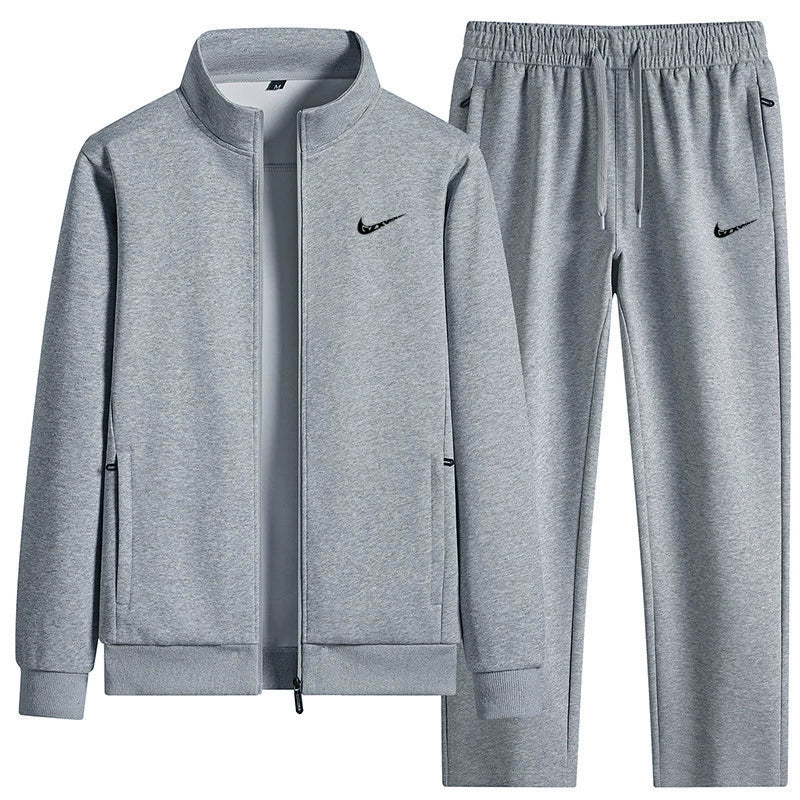 Completo tuta nero con giacca zip e pantaloni